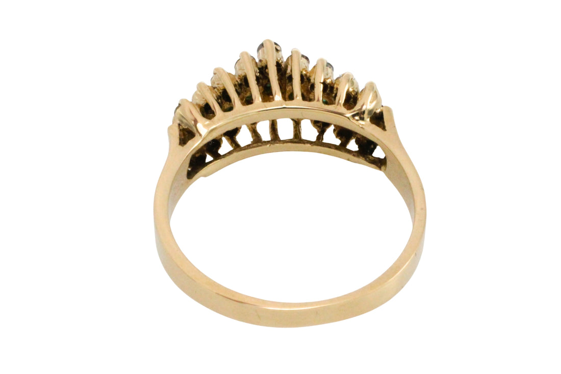 Emerld and diamond ring in 14 carat gold