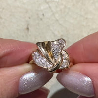 Diamond bow ring in 14 carat gold