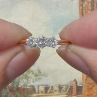 Vintage three stone brilliant cut diamond ring