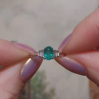 Emerald and diamond ring in white gold