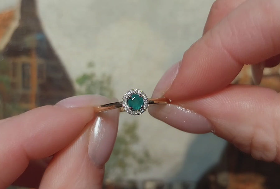 Vintage smaragd en diamanten cluster ring