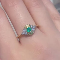 Emerald and zircon ring in 18 carat gold