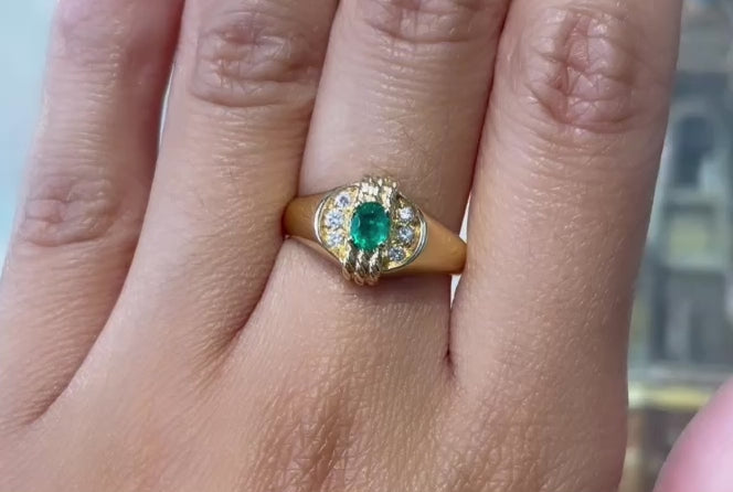 Emerald and diamond ring in 18 carat gold