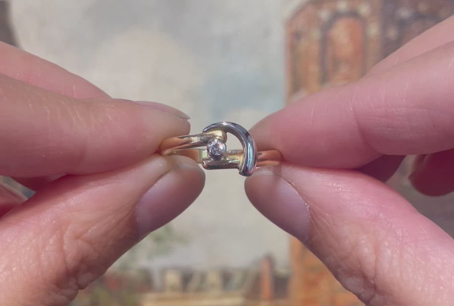 18 carat white and yellow gold diamond ring