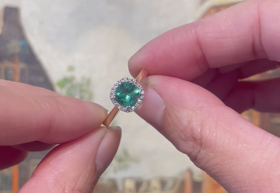 Emerald and diamond ring in 18 carat gold