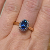 Sapphire and diamond cluster ring in 18 carat gold