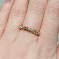 Diamond half eternity band in 18 carat gold