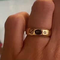 Sapphire and diamond trilogy ring in 18 carat gold.